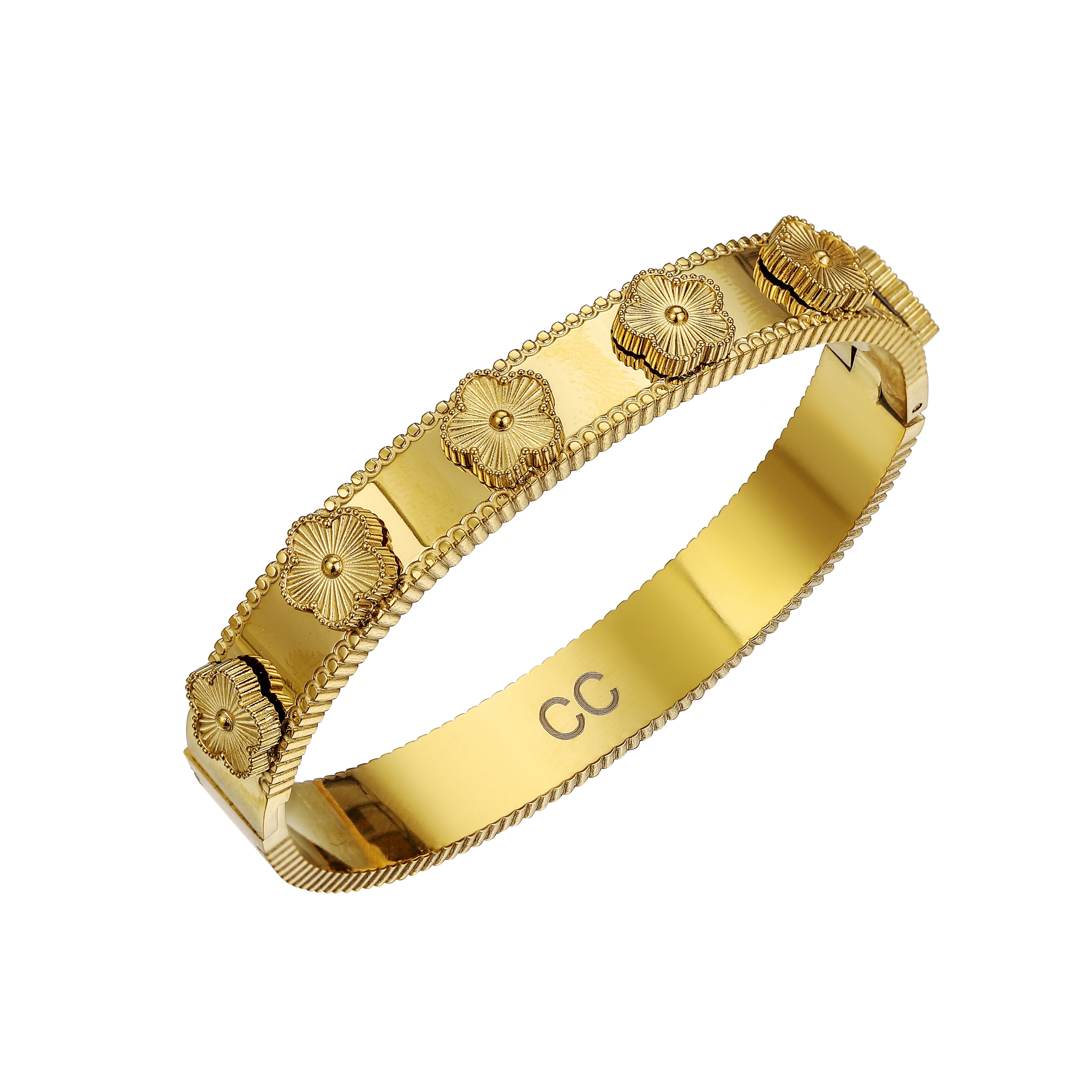 An 18k gold plated stainless steel elanur clover bangle with a floral pattern and an open clasp.