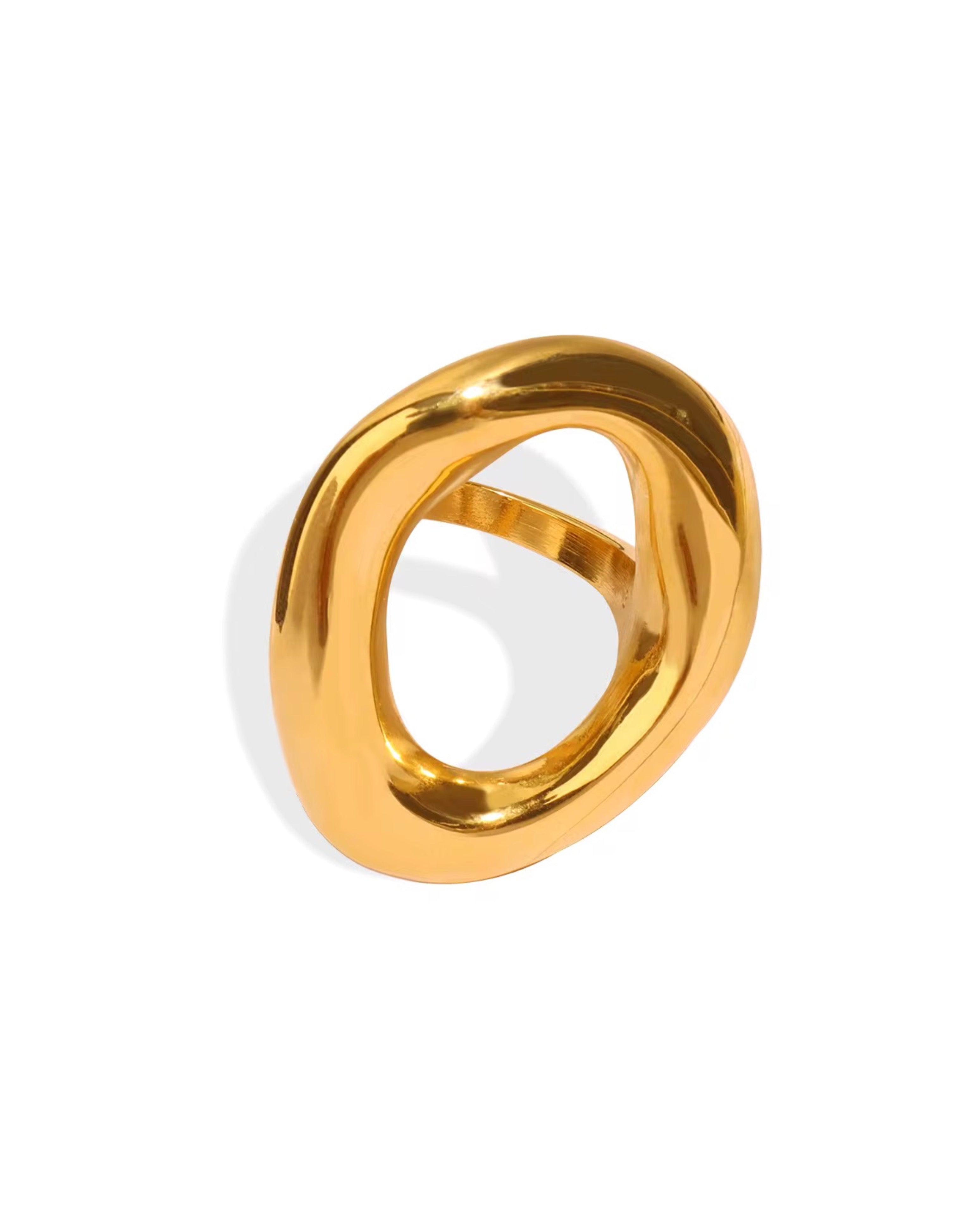Gold jemma ring on a white background