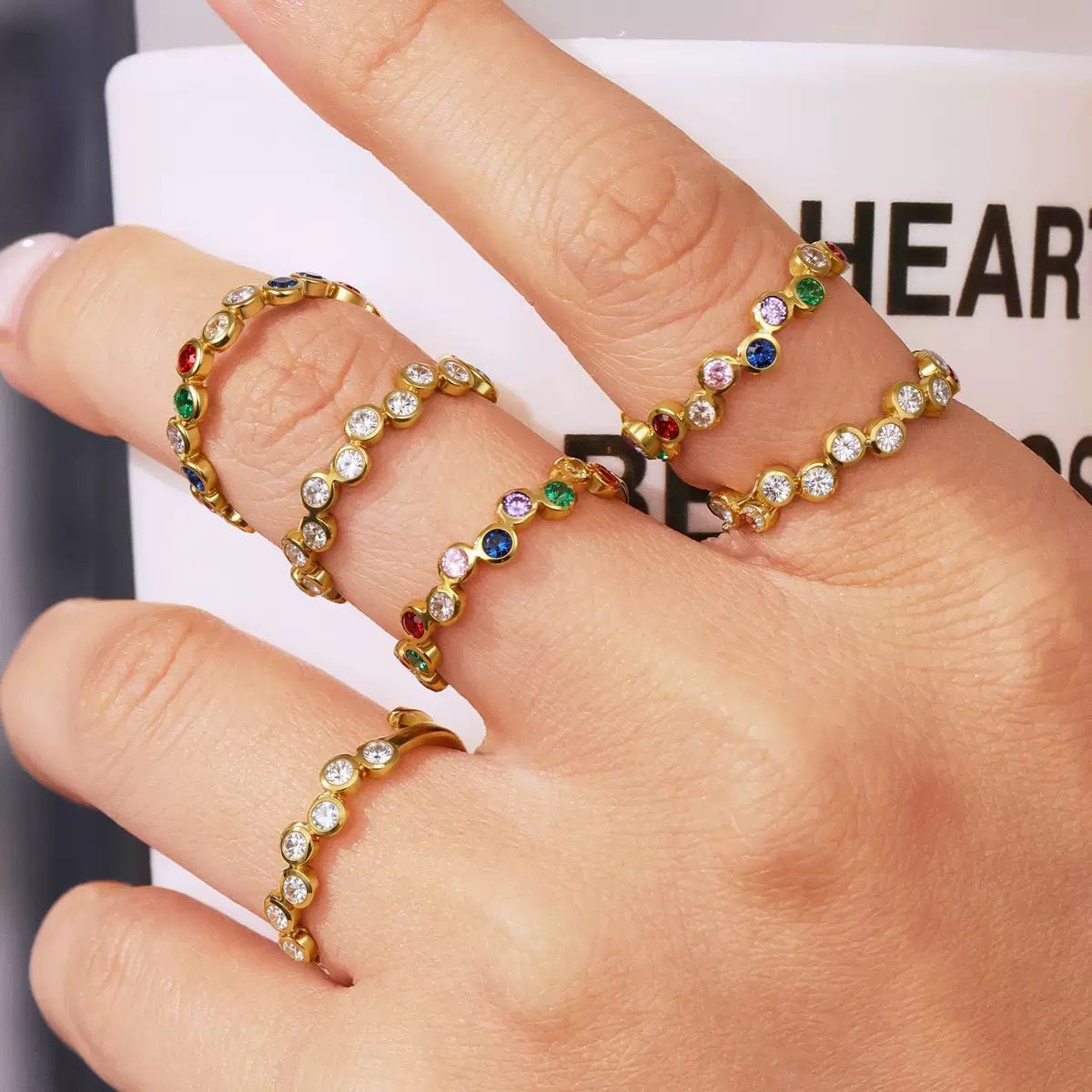 Gold ring with colorful gemstones 