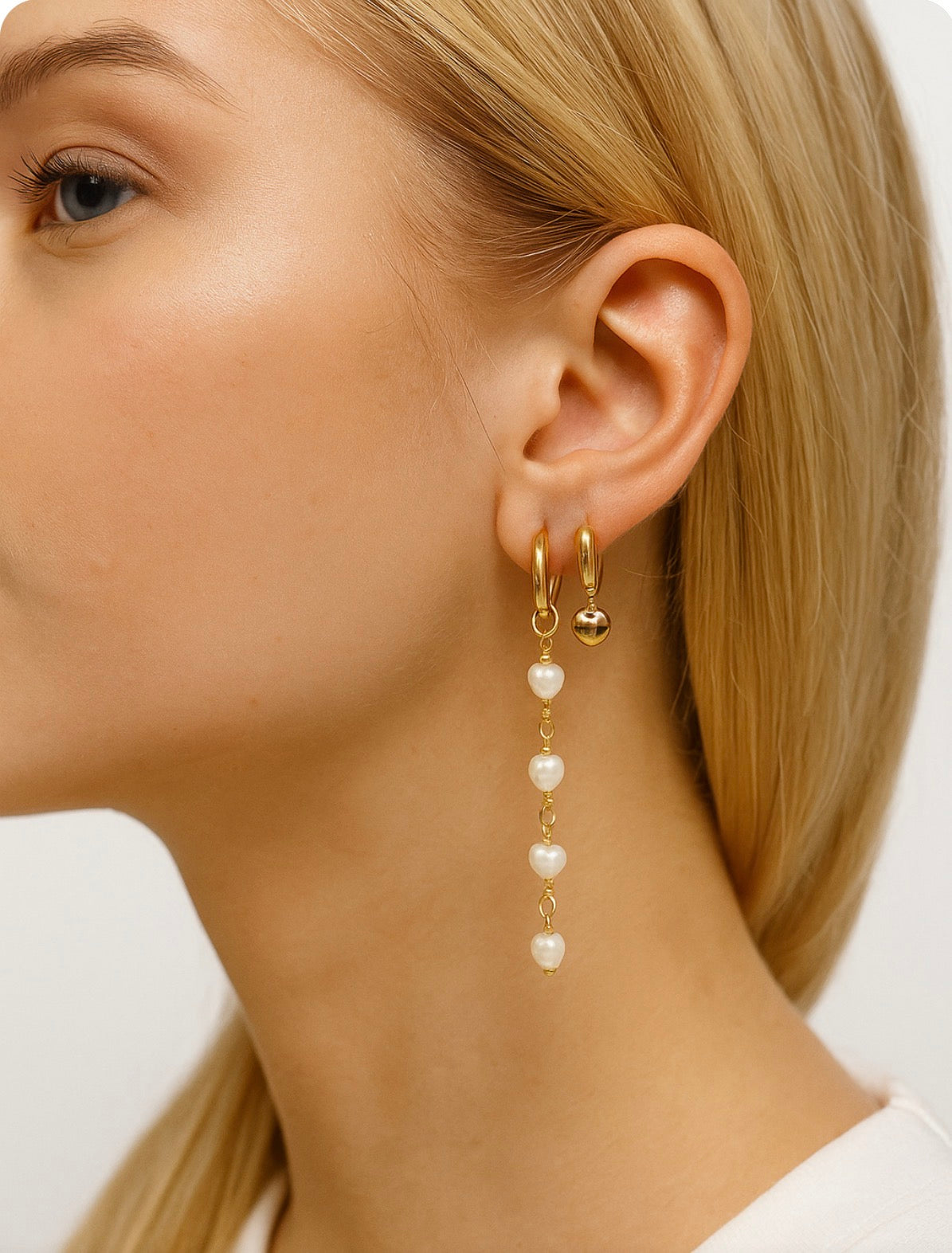 Lange hart parel en gouden hart oor feest ringen