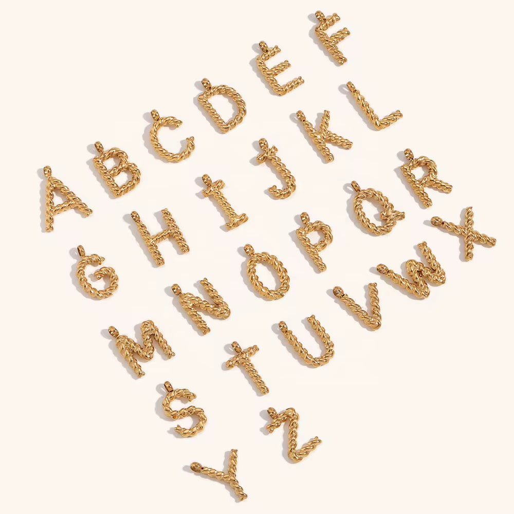 TWISTED LETTER CHARM