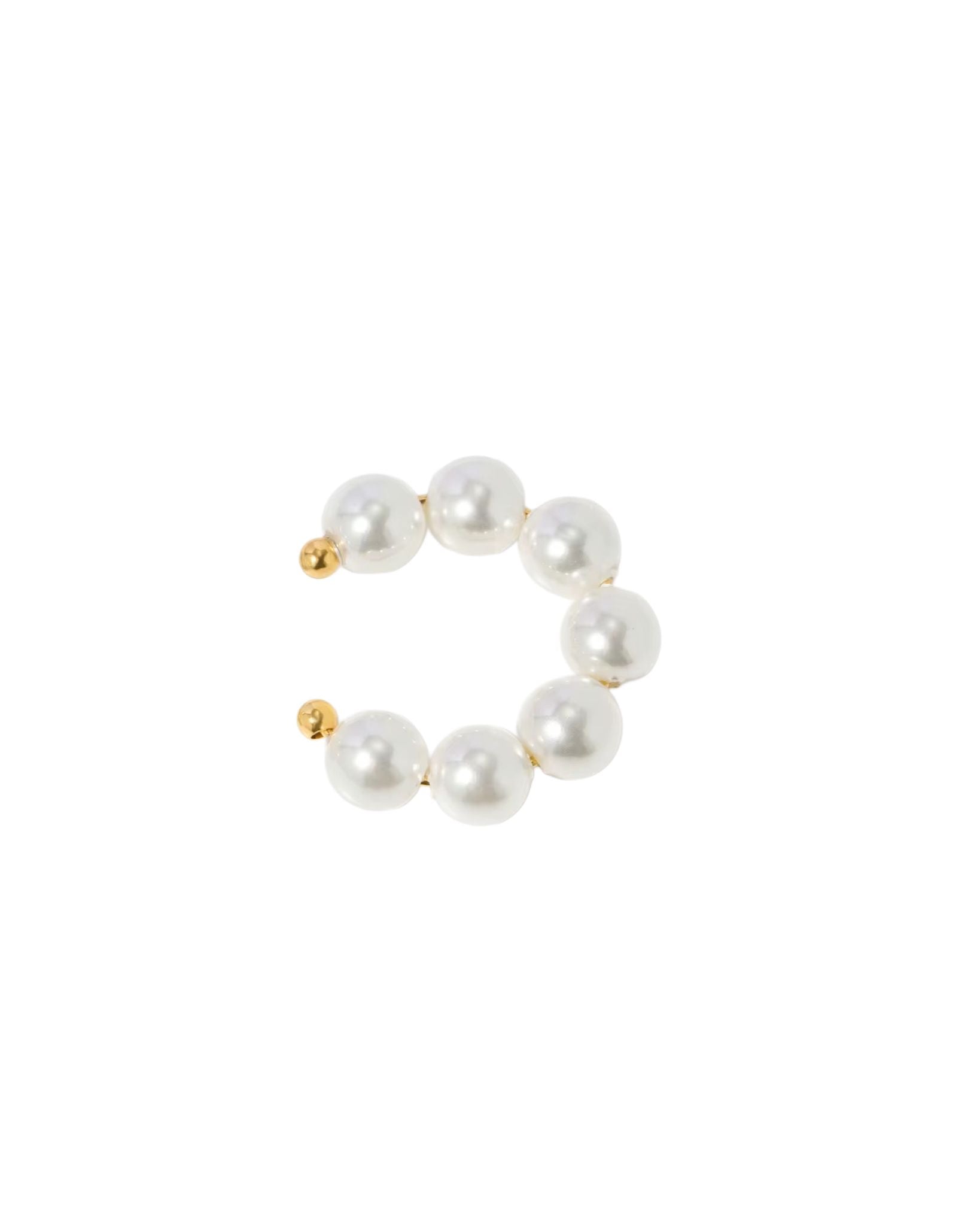 Pearl bracelet with gold accents on a white background