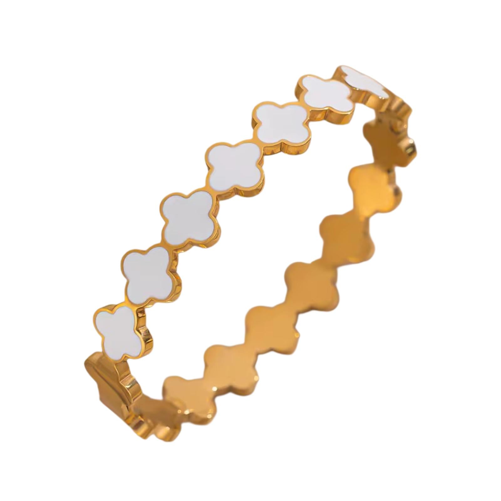 An 18k gold plated stainless steel sarah bracelet with a clover pattern, featuring white accents.