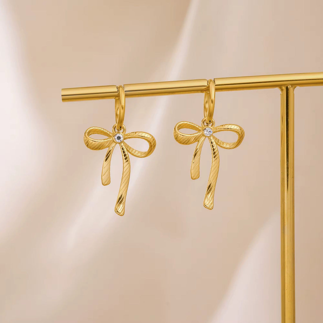 ZIRCON BOW EARRING