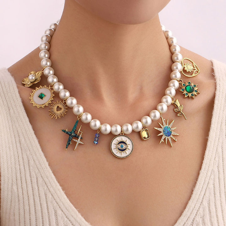 PRECIOUS PEARLS MULTI CHARM NECKLACE