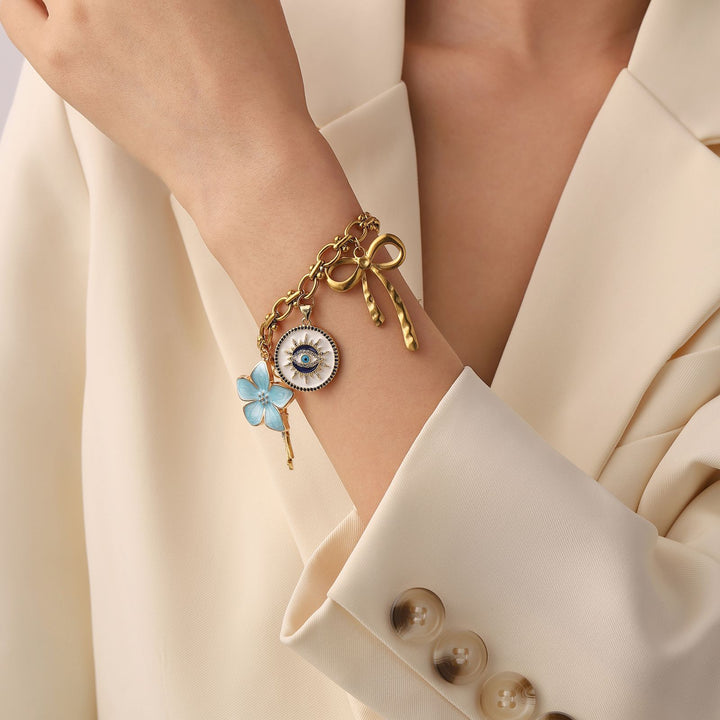 ENCHANTED ESSENCE MULTI CHARM BRACELET