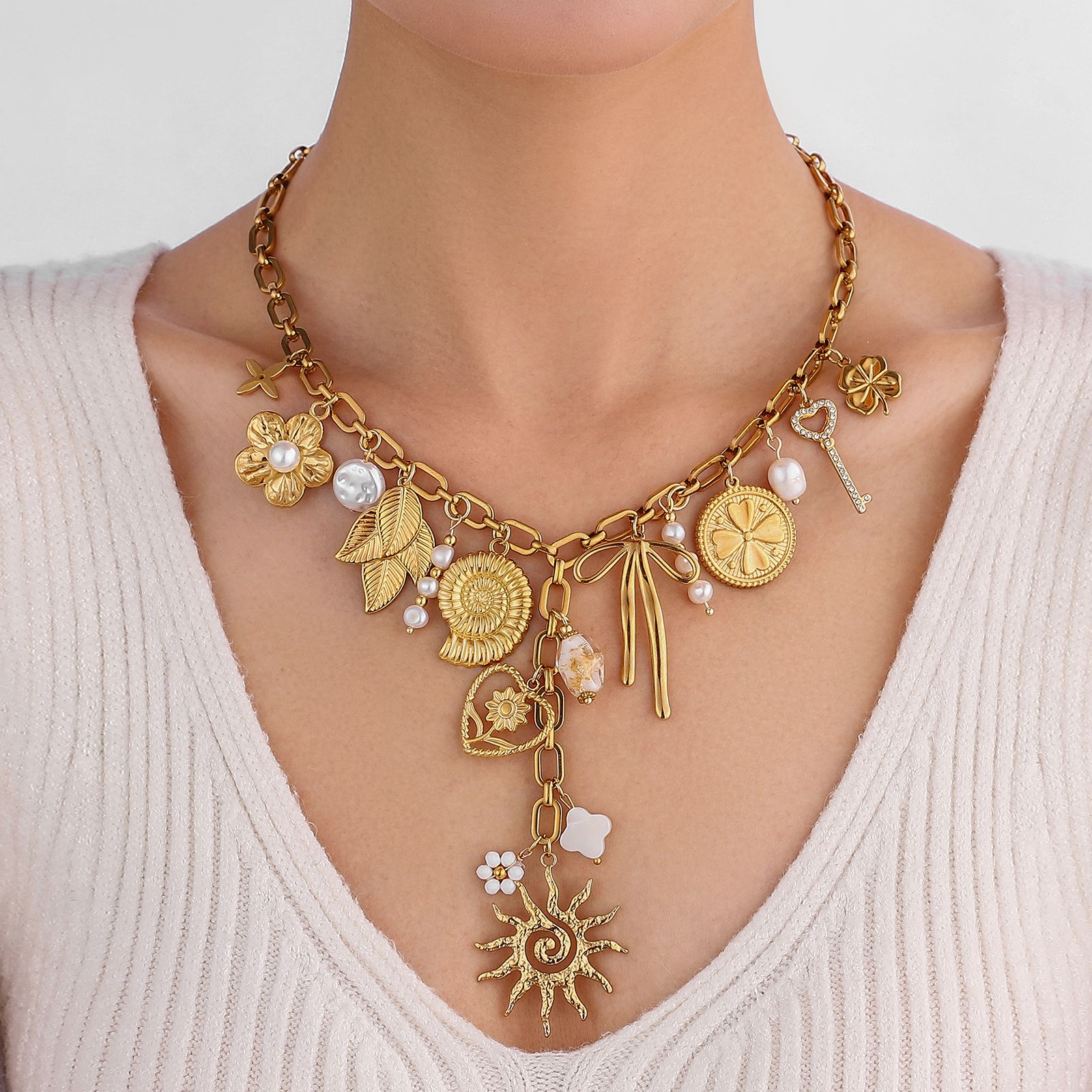 SUN-KISSED PEARL MULTI CHARM NECKLACE
