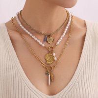 SHELL PEARL CLASP NECKLACE