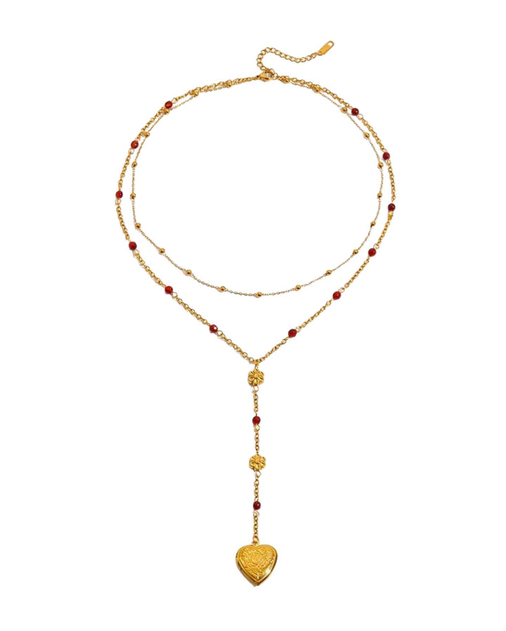 Gold necklace with heart pendant for her