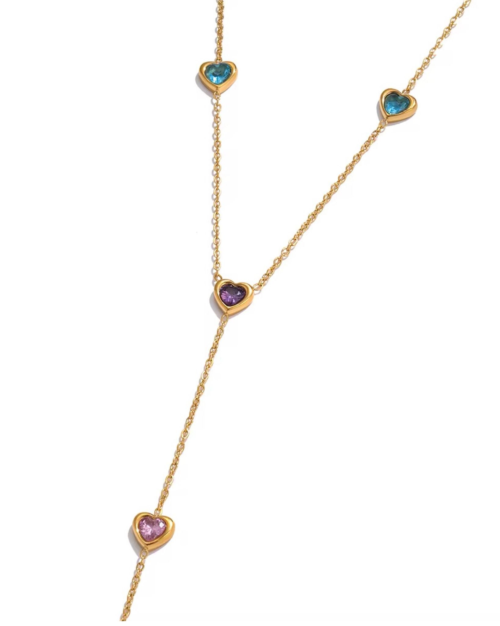 Gold necklace with heart-shaped pendants for her