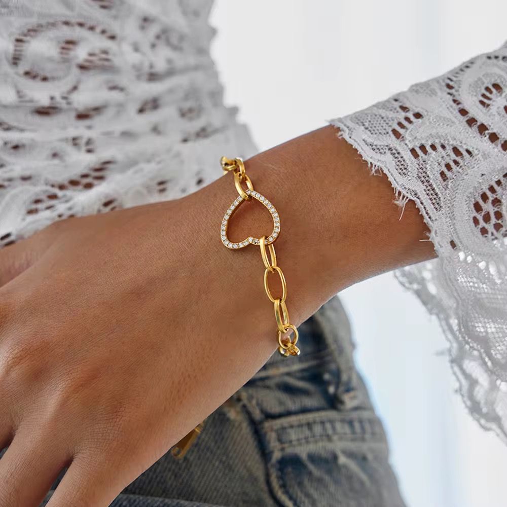 Gold chain bracelet with heart for her