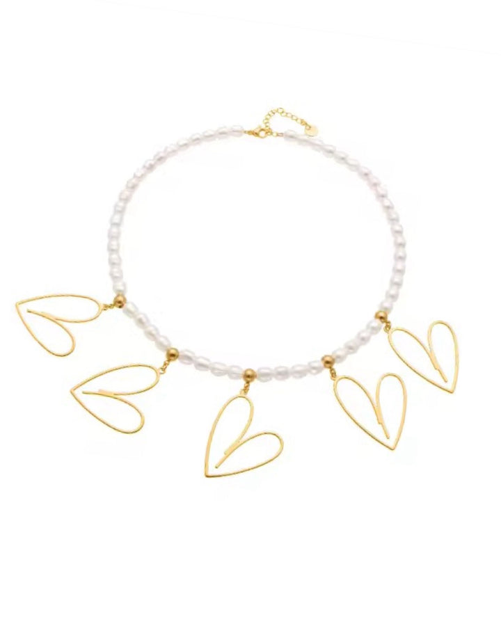 Necklace with gold heart pendants for her