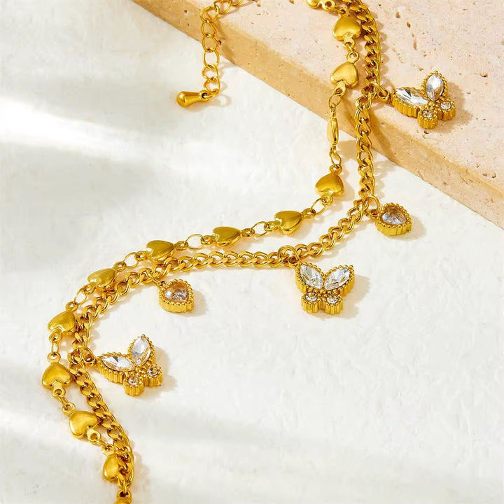 Gold chain bracelet with butterfly pendants for her
