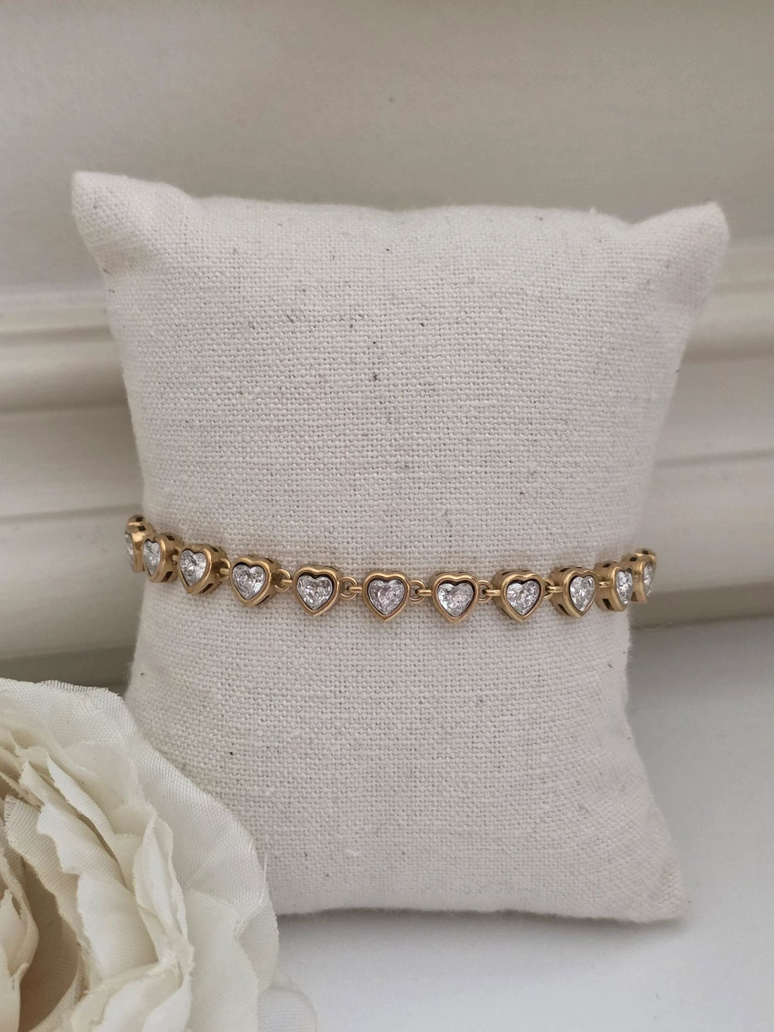 Beautiful gold bracelet with hearts for her