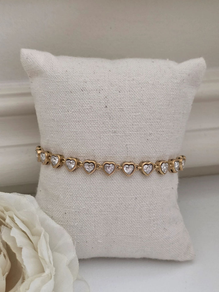 Beautiful gold bracelet with hearts for her