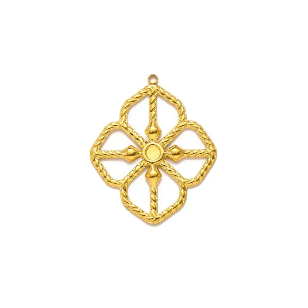 Gold charm with intricate design for her