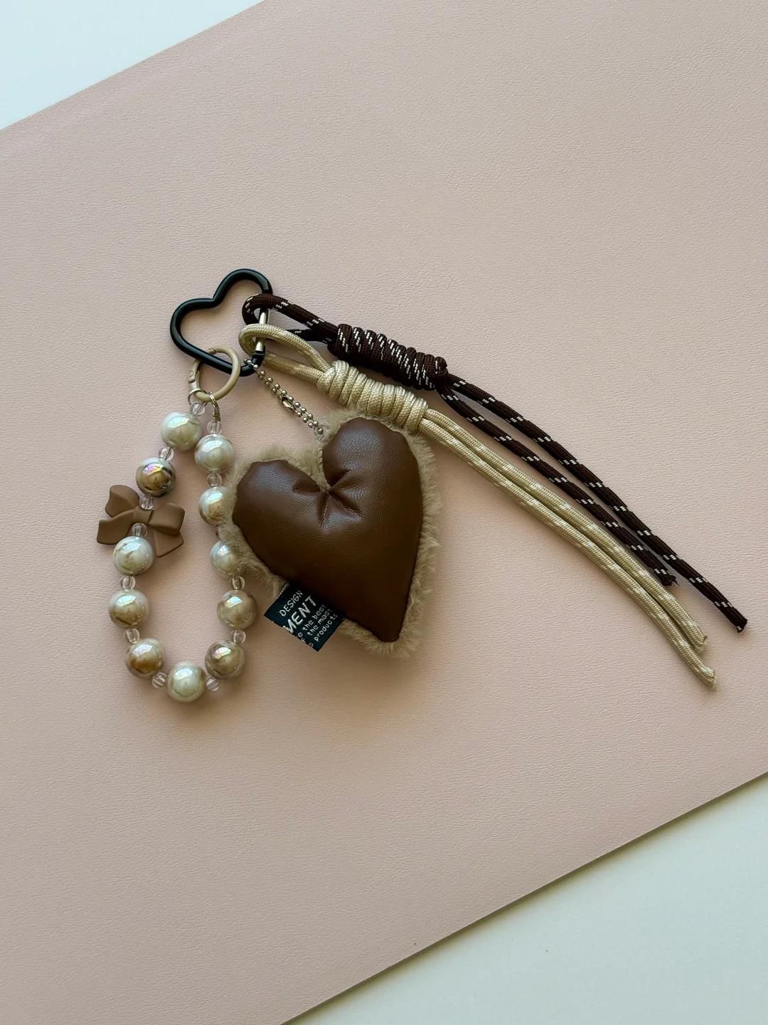 CC LEATHER HEART AND PEARL BAG CHARM