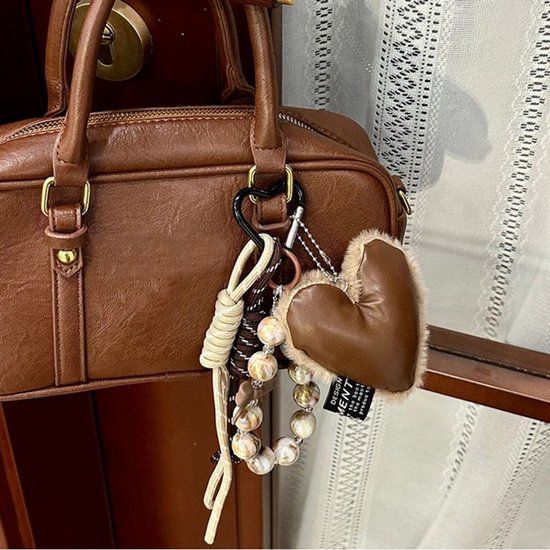 CC LEATHER HEART AND PEARL BAG CHARM