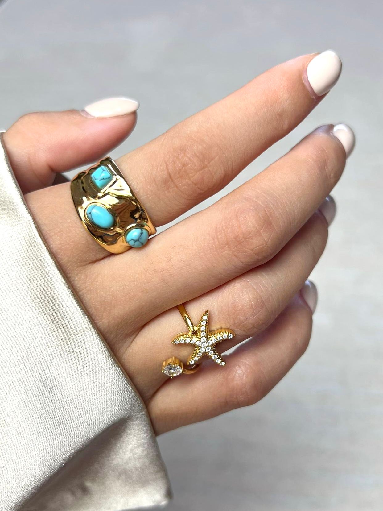 designer stainless steel aquamarine rekbas and starfish rings for her