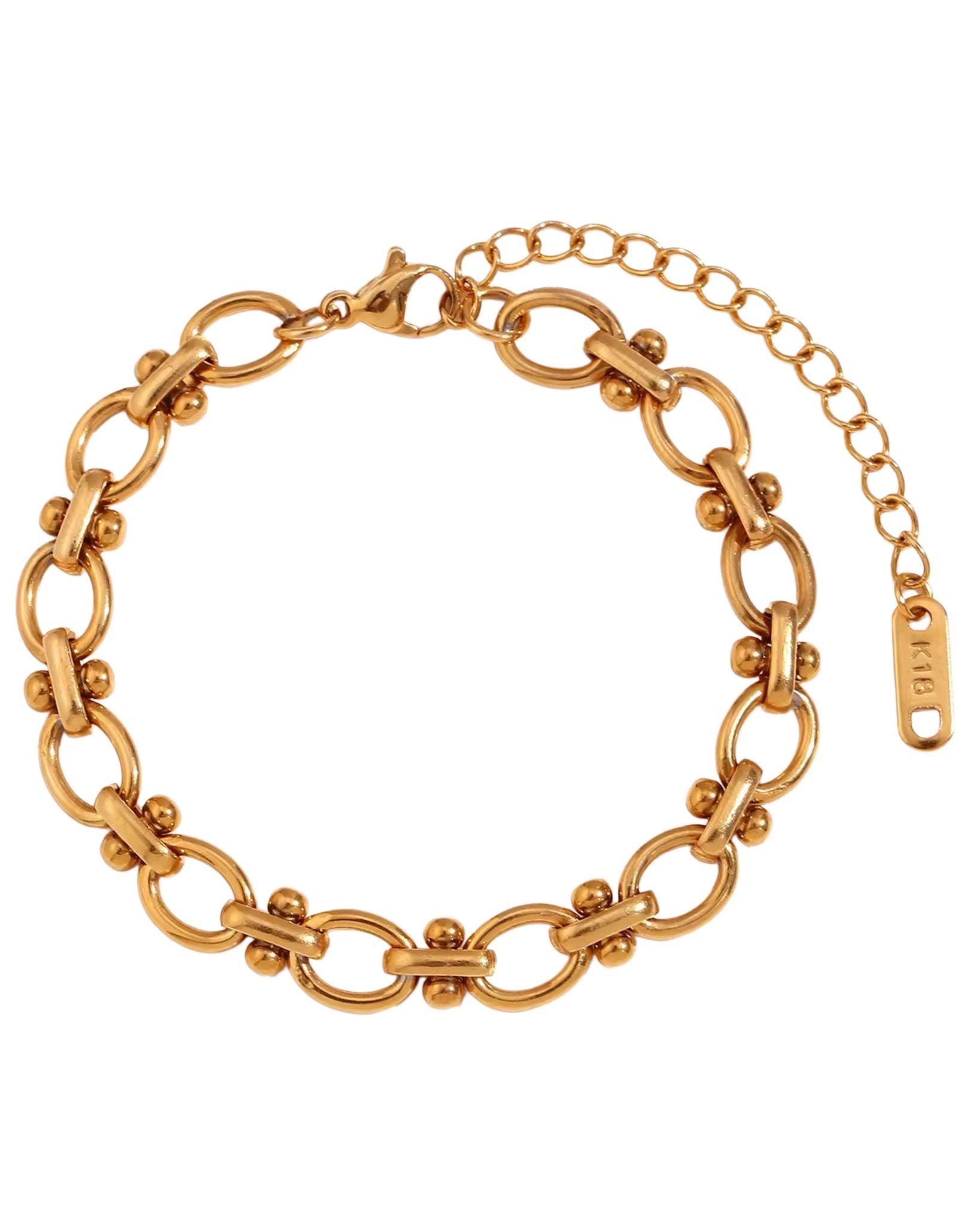 Gold block chain bracelet on a white background