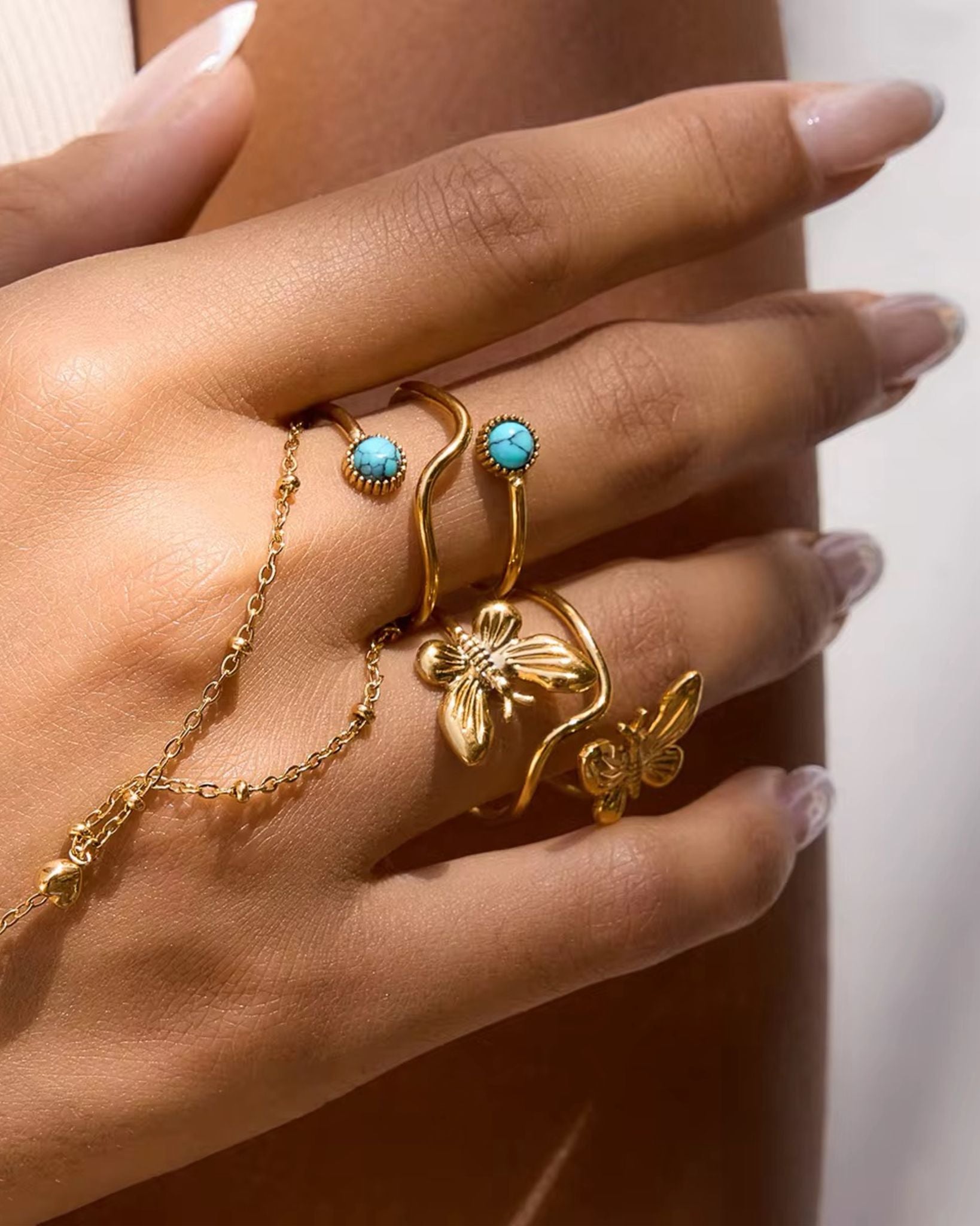Slim gold blue moonstone and butterfly ring with stylish design for her