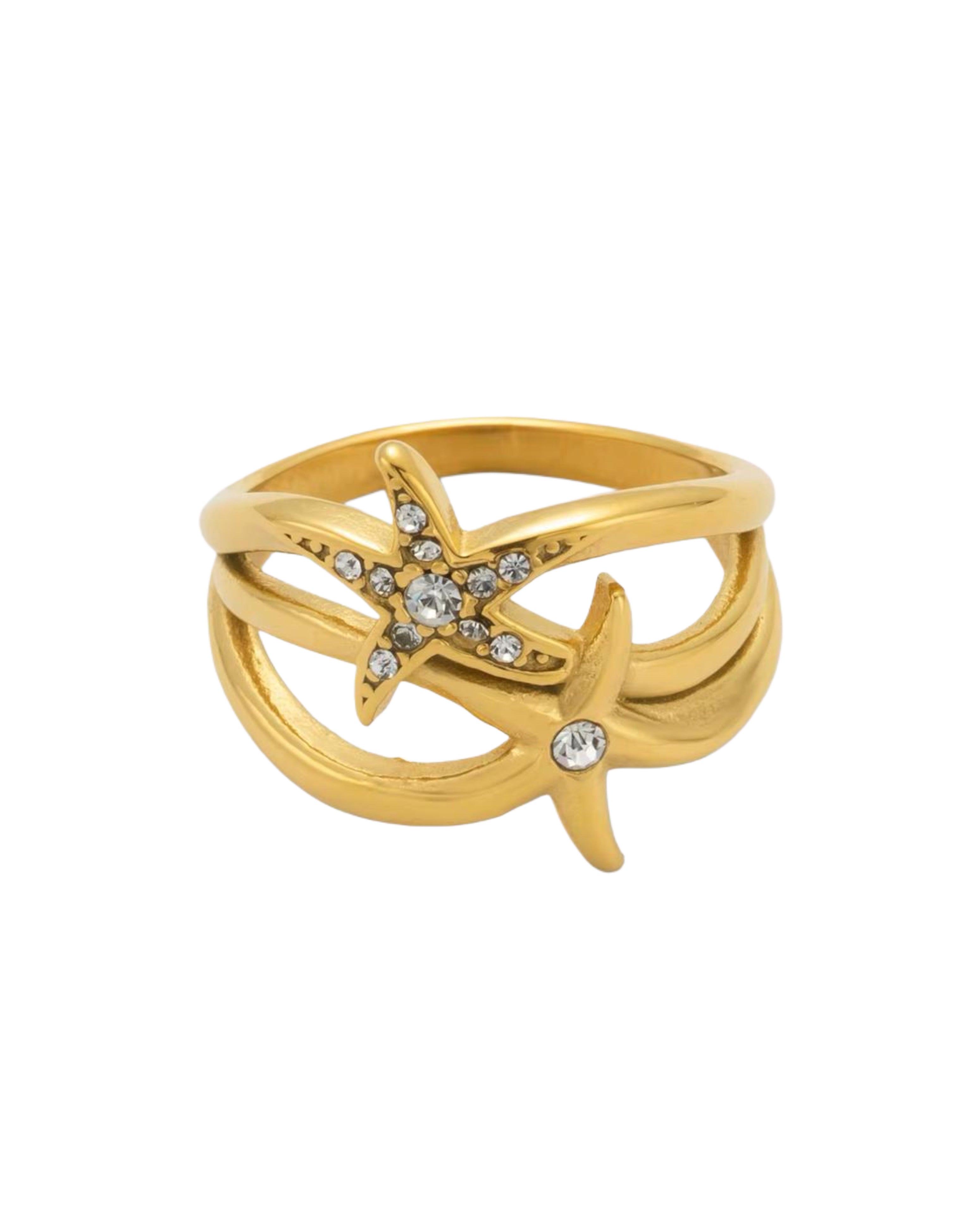 Gold double star ring with starfish design on a white background