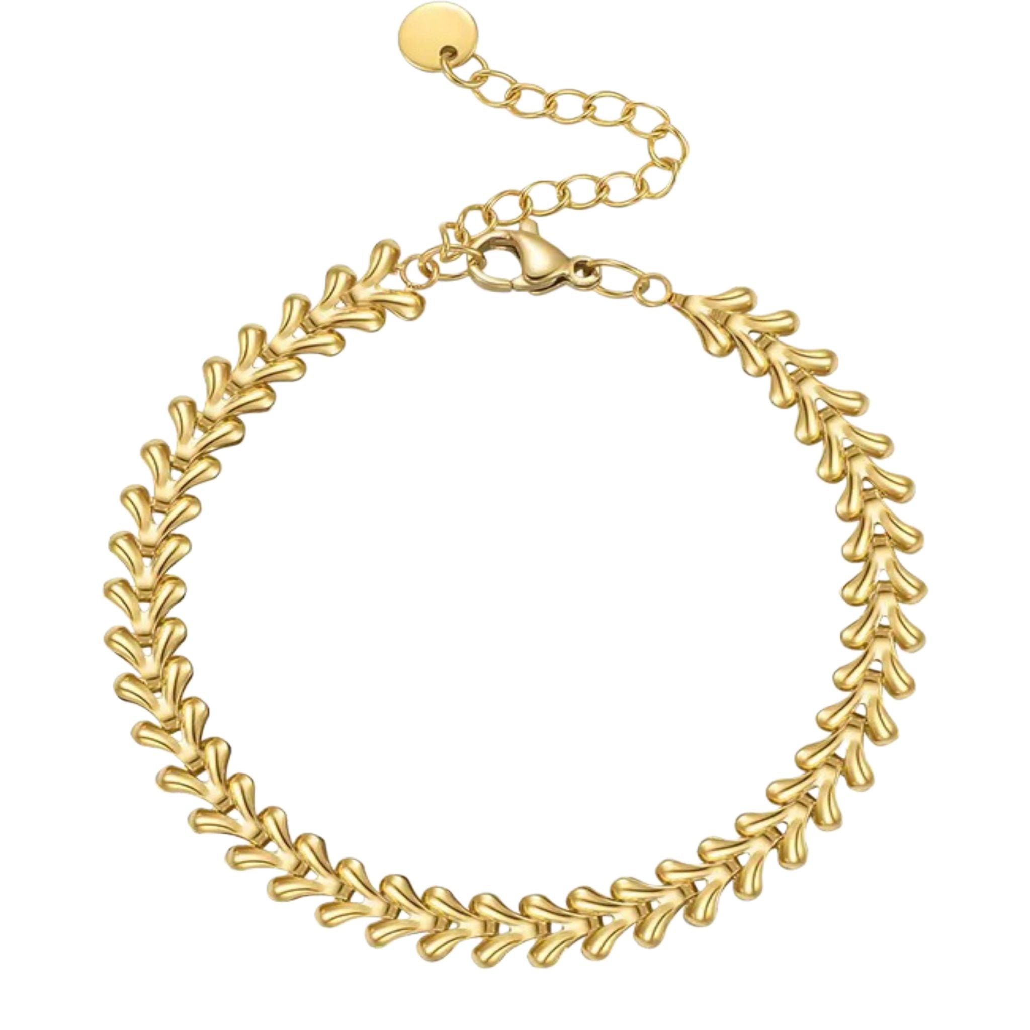 A gold-colored bracelet with a detailed link design, featuring a clasp closure.
