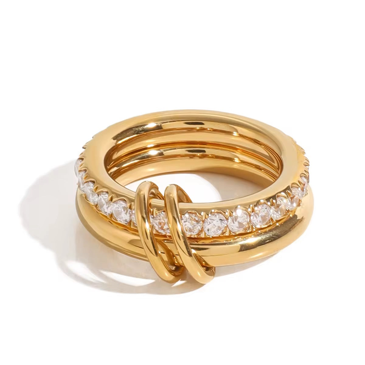A gold-colored double-layer hayley ring with zirconia stones, displayed on a white background