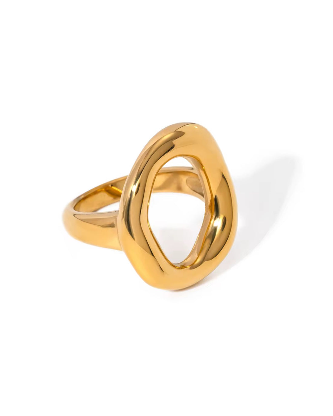 Gold jemma ring with a unique design on a white background