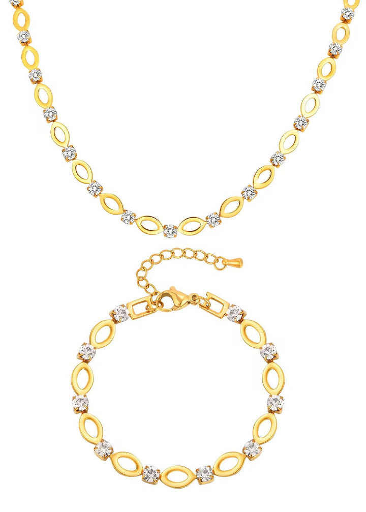 Gold necklace and bracelet set on a white background
