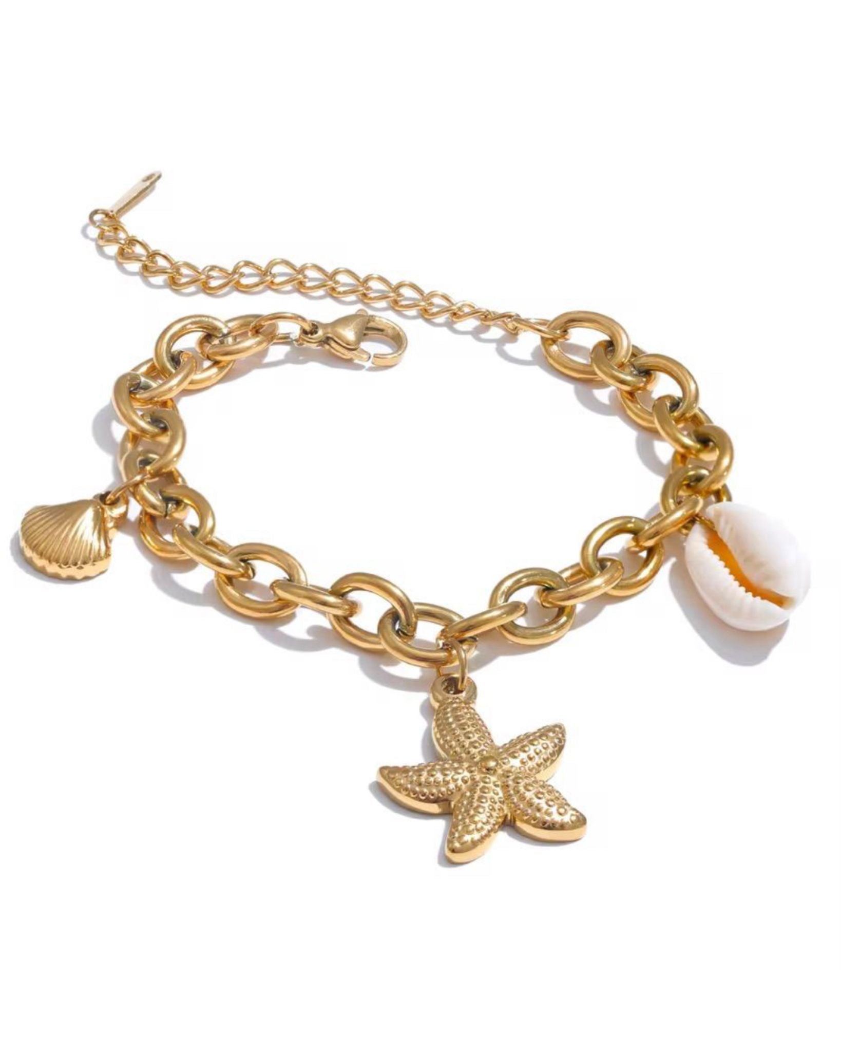 Gold chain oceana grande bracelet with starfish and shell charms on a white background