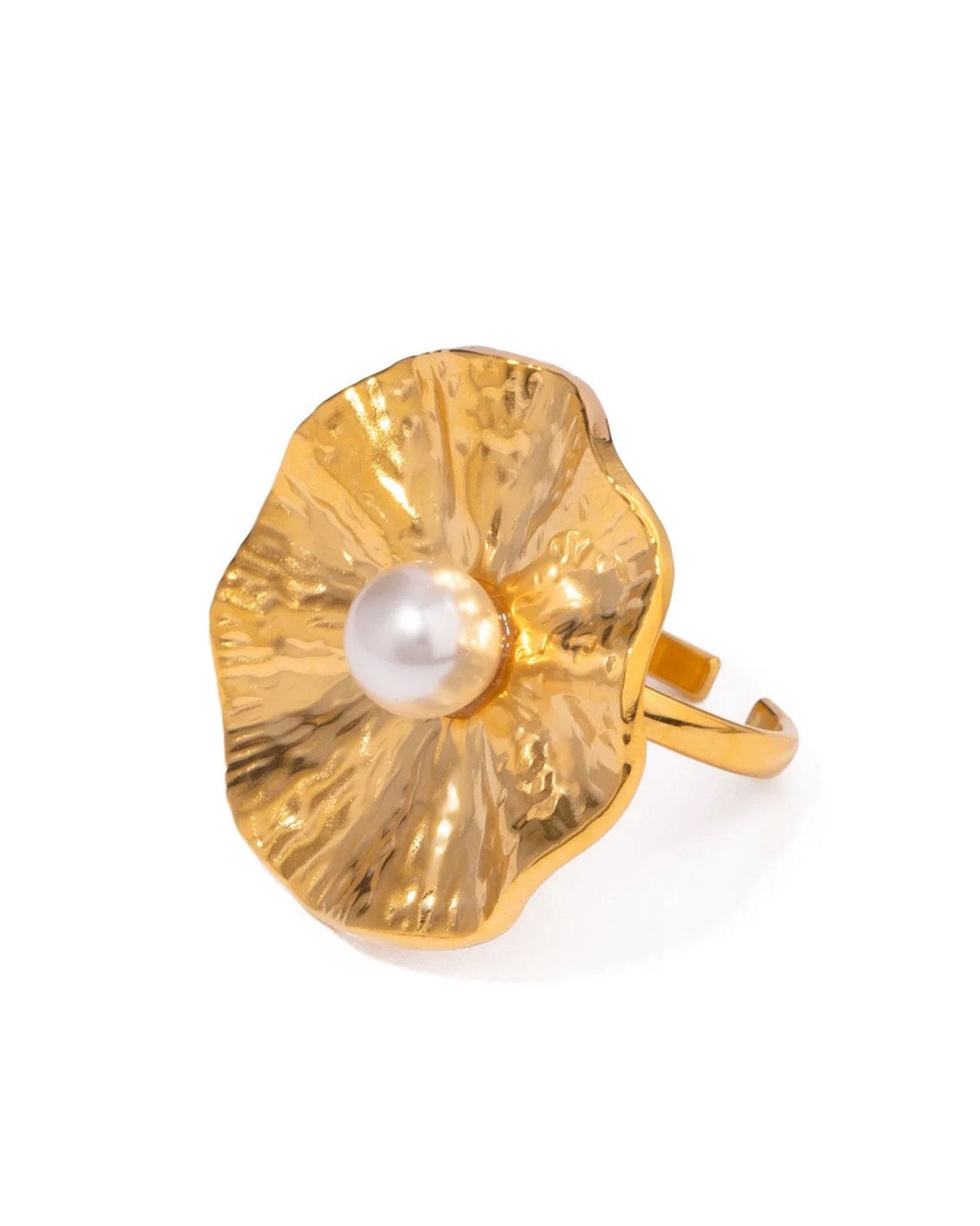 Gold pearl orbit ring with a pearl center on a white background