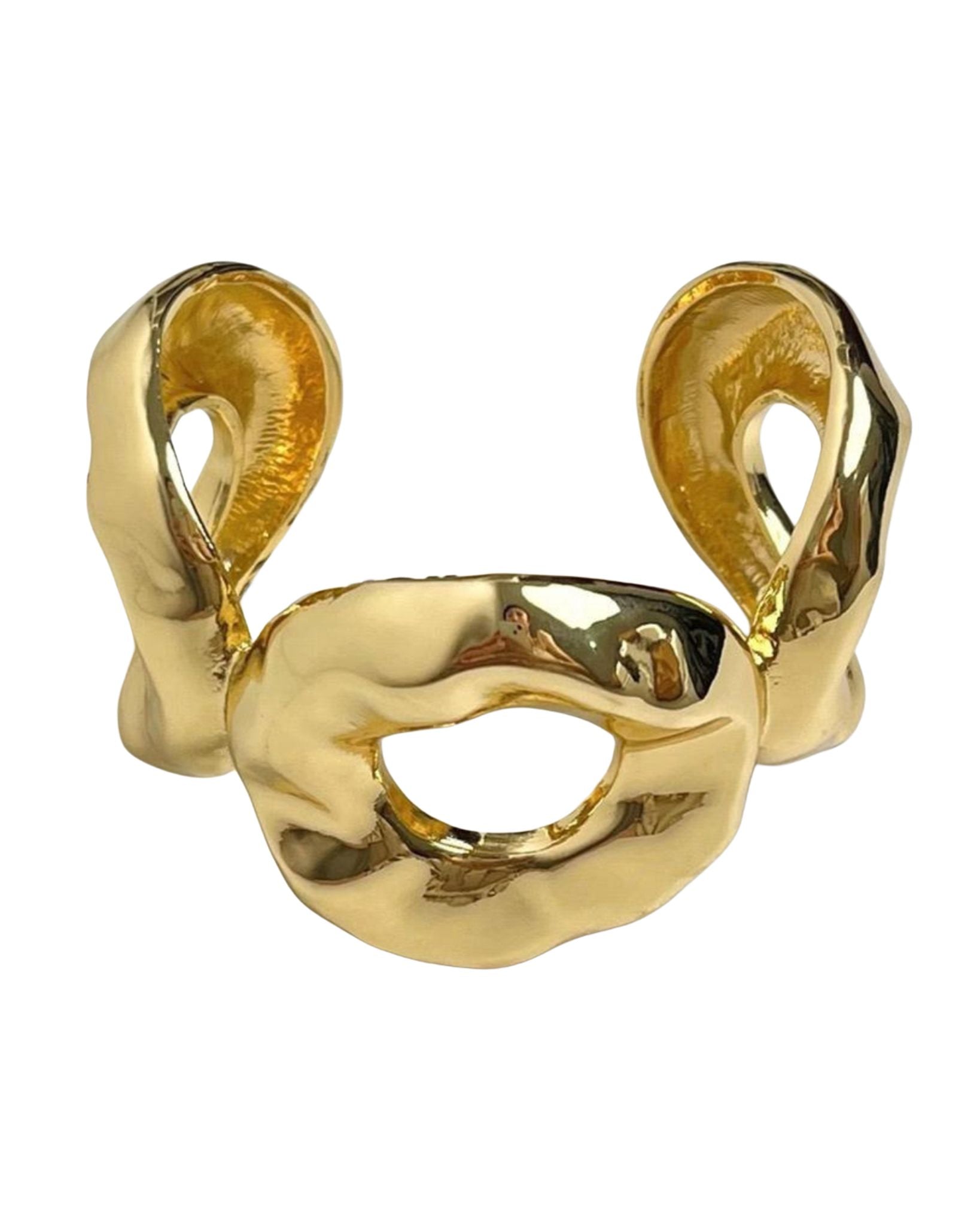 Gold ring with a unique design on a white background