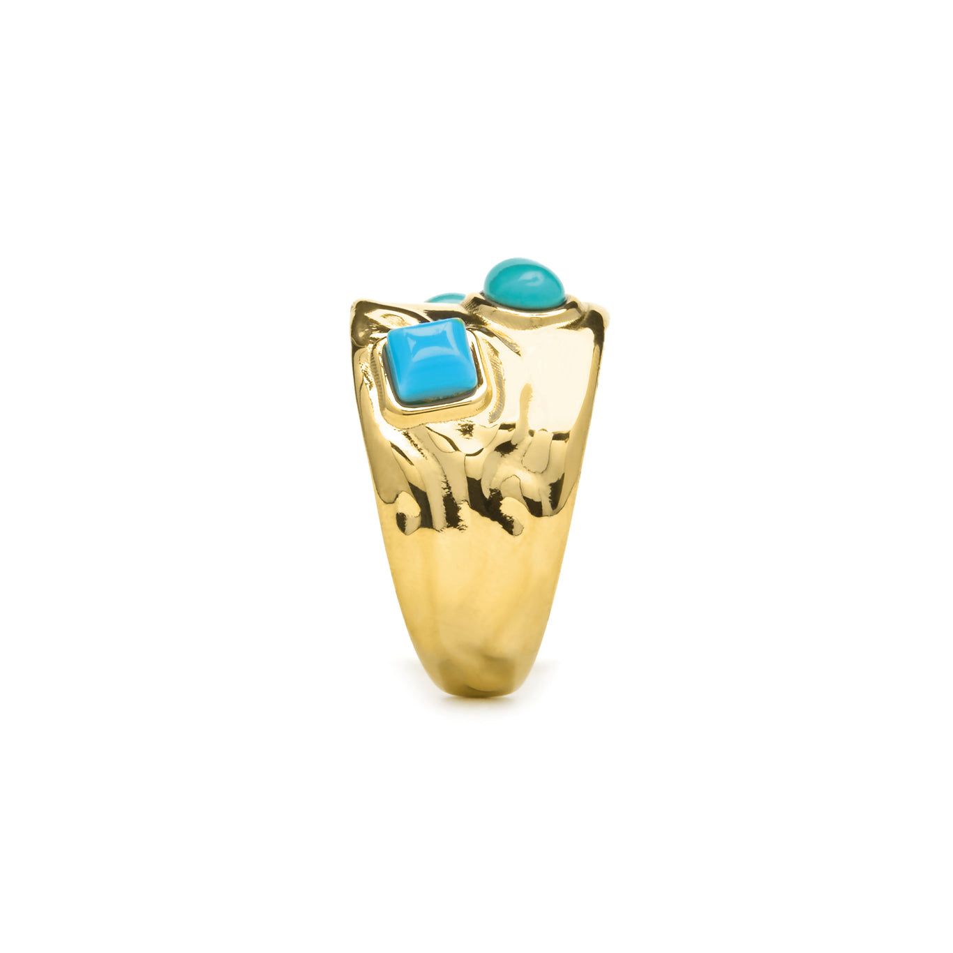 Gold ring with turquoise stones on a white background