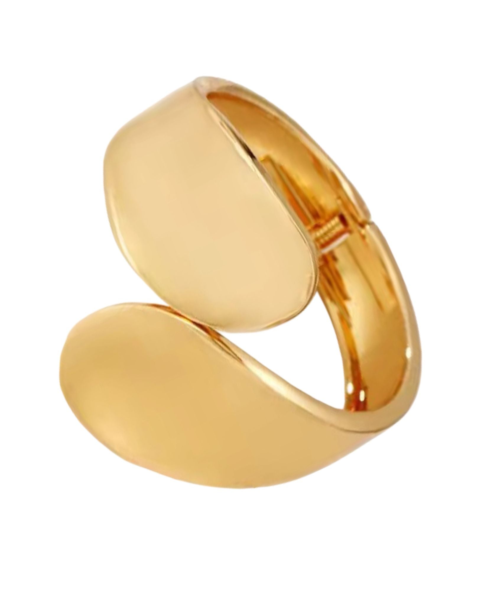 Gold ring with a unique oval design on a white background